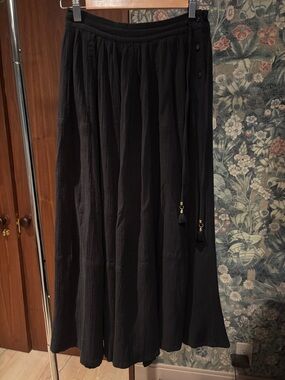 Suzie Kondi gauze button and tassel skirt. NWOT